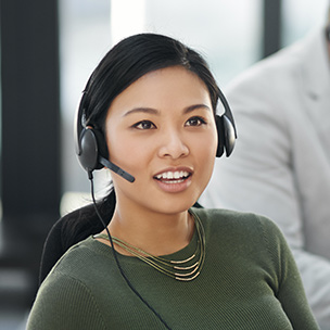 A woman in a call using a headset 